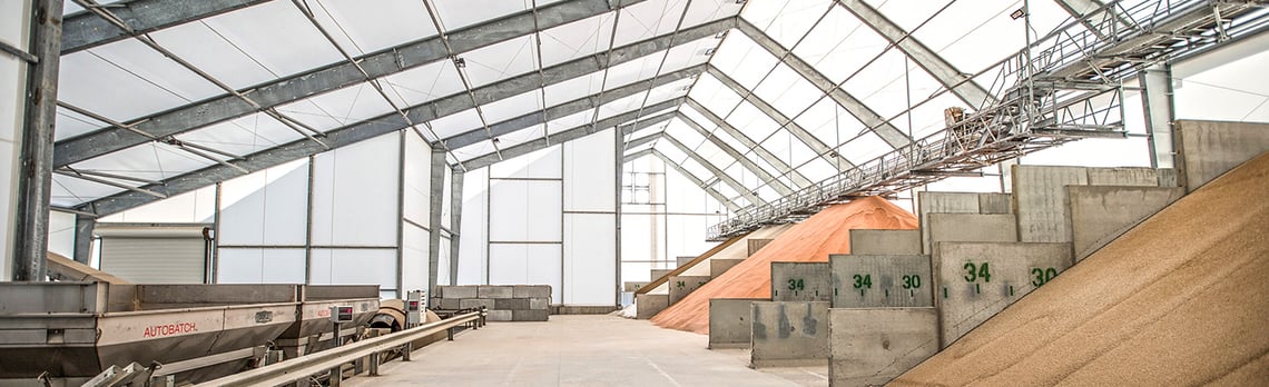 bulk fertilizer storage building with conveyor and precast panels