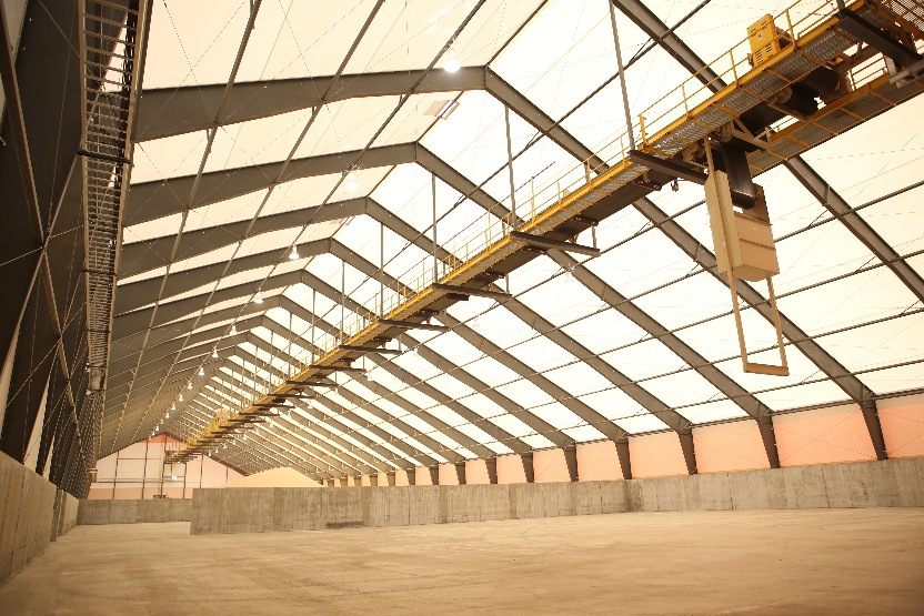Interior shot of fabric building featuring hanging loads | Rigid Frame Building Design