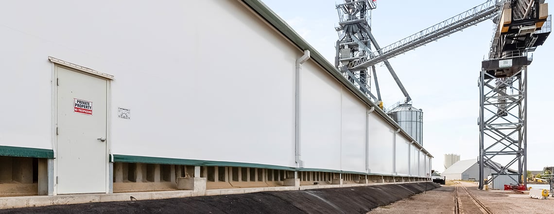 gutters and downspouts on tension fabric building