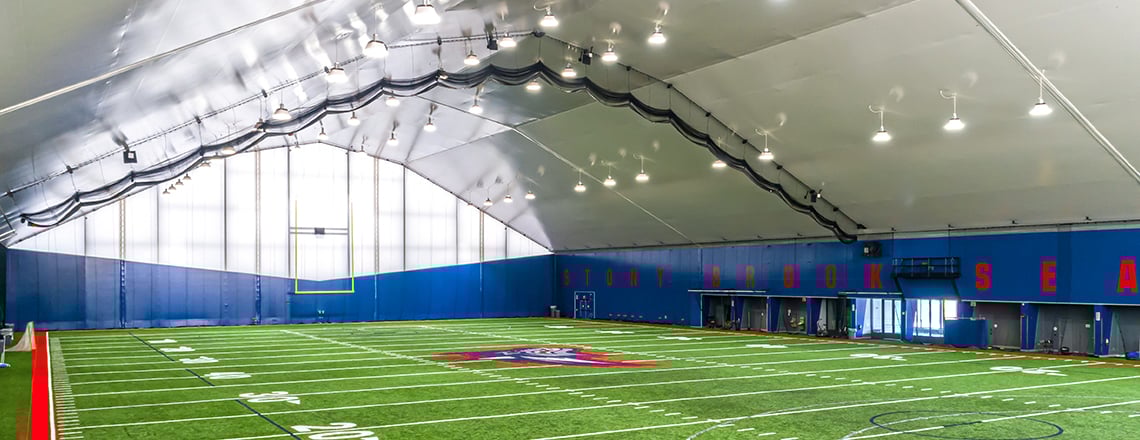 tension fabric fieldhouse with custom signage and graphics