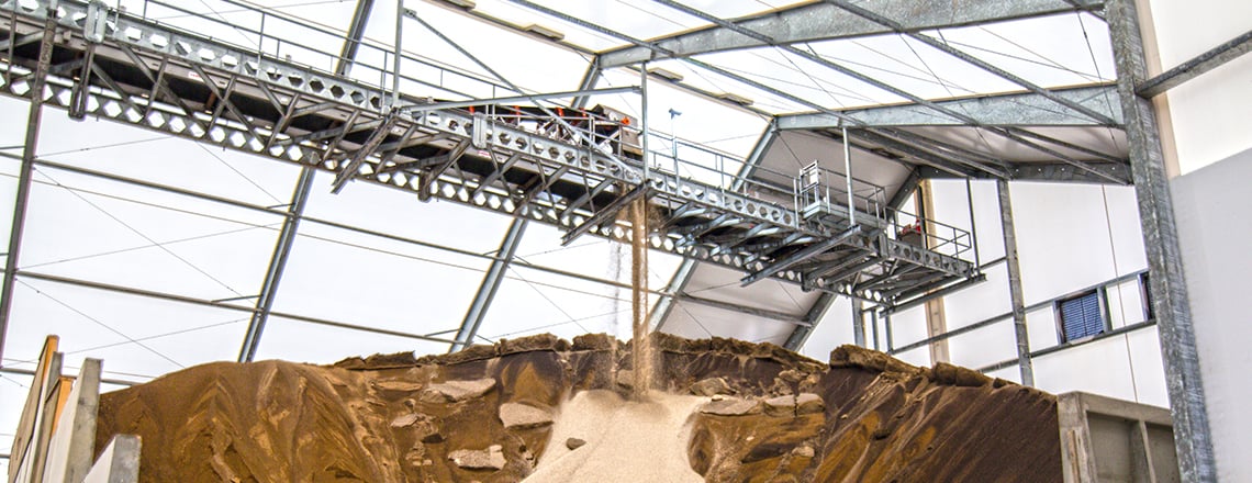 fabric fertilizer building with conveyor and precast walls