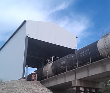 fabric building over train tracks