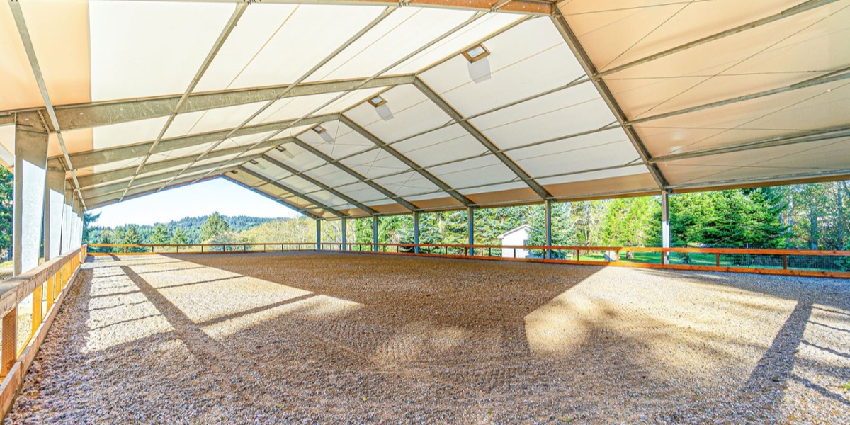 Constructing Fabric Buildings with Solid Steel Frames